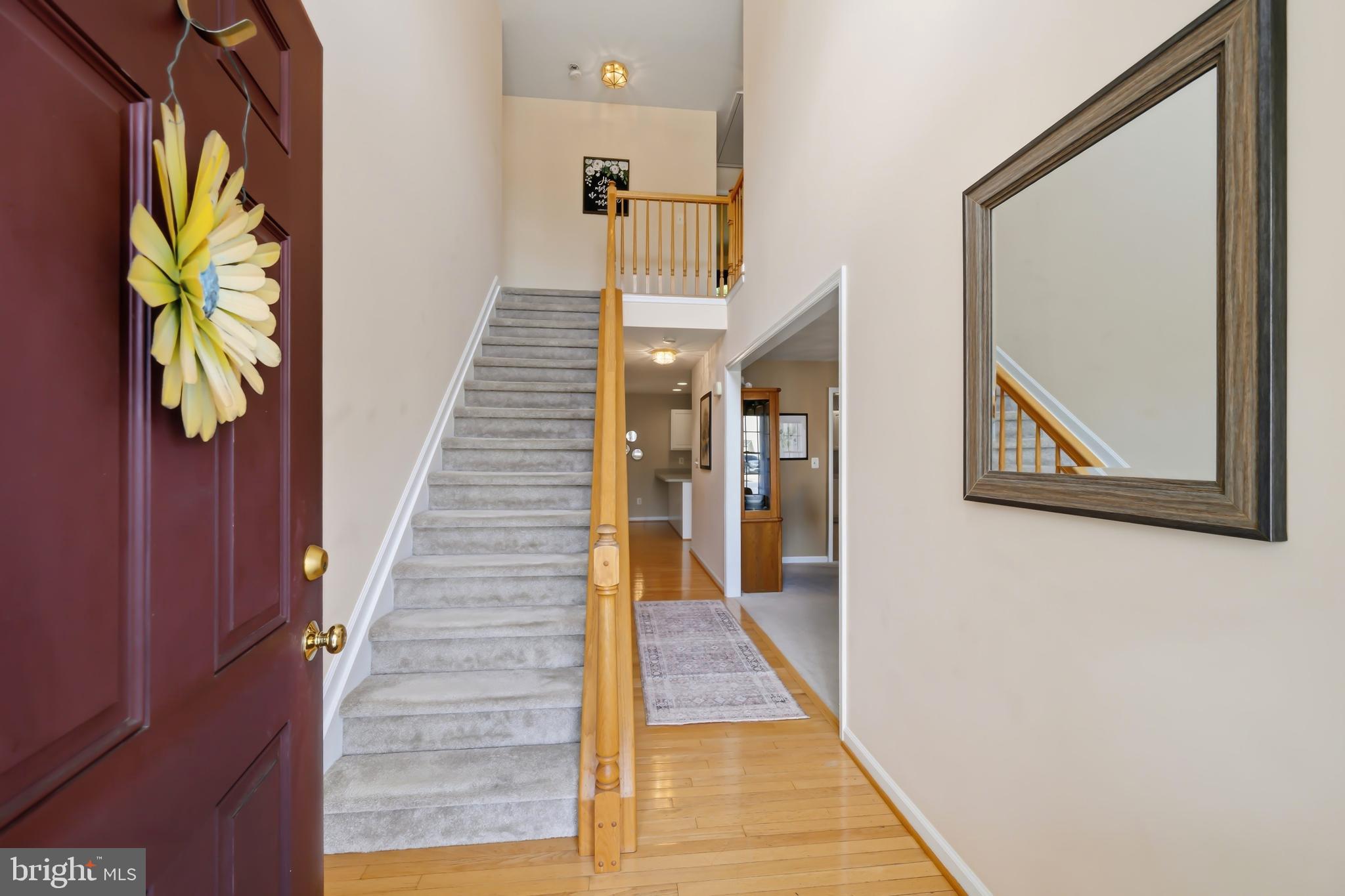 112 Rilian Court Grasonville, MD 21638 - Photo 5 of 55 a view of entryway and hall with wooden floor