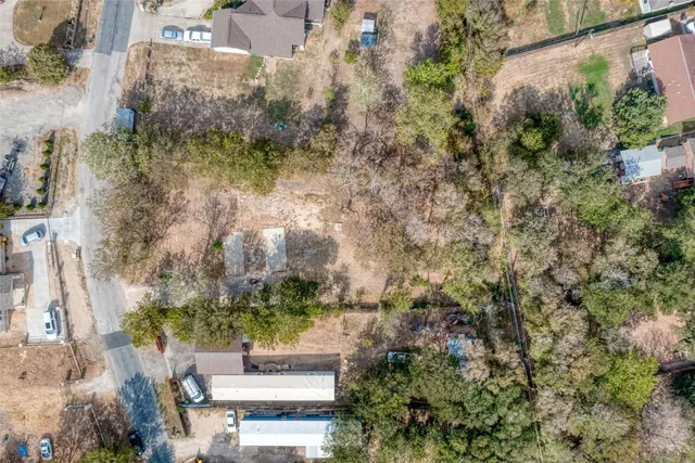 an aerial view of residential house with outdoor space