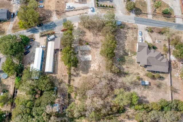 an aerial view of residential house with outdoor space