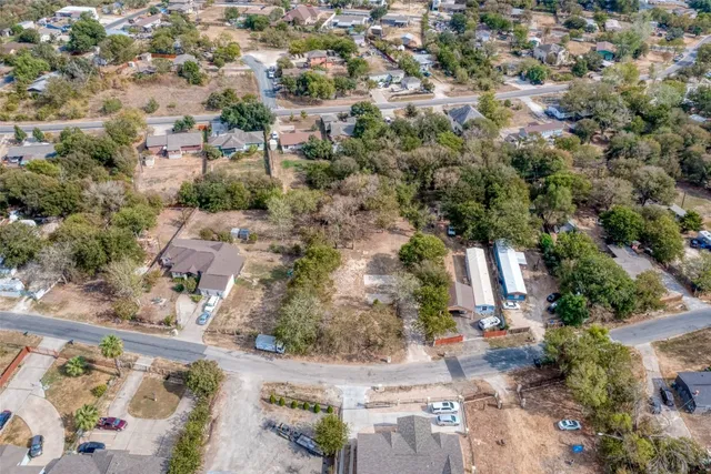 an aerial view of residential house with outdoor space