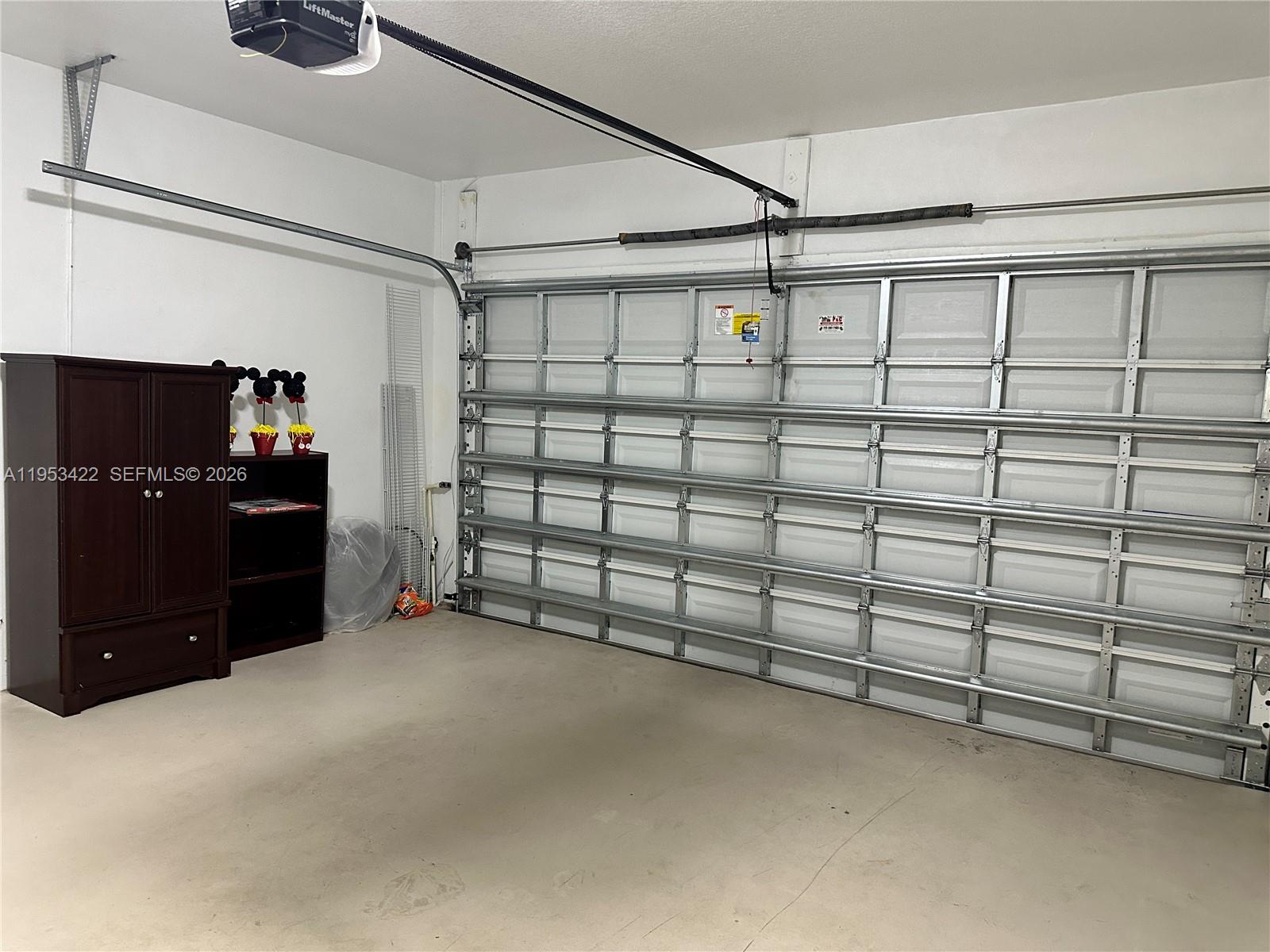 1222 Southwest Herald Road Port St. Lucie, FL 34953 - Photo 15 of 25 a view of a garage