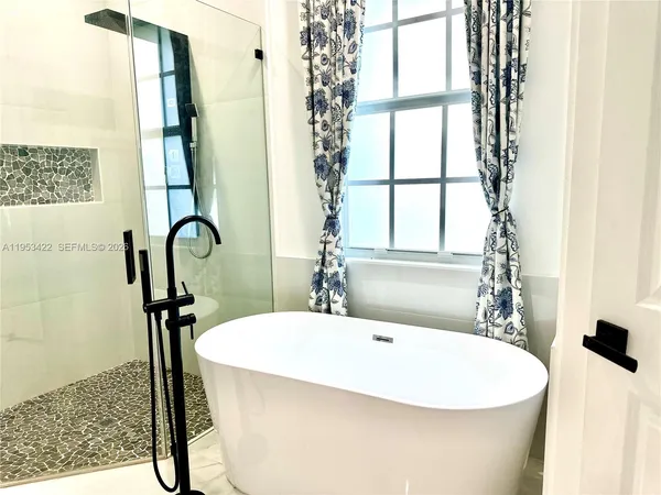 a bathroom with a bathtub