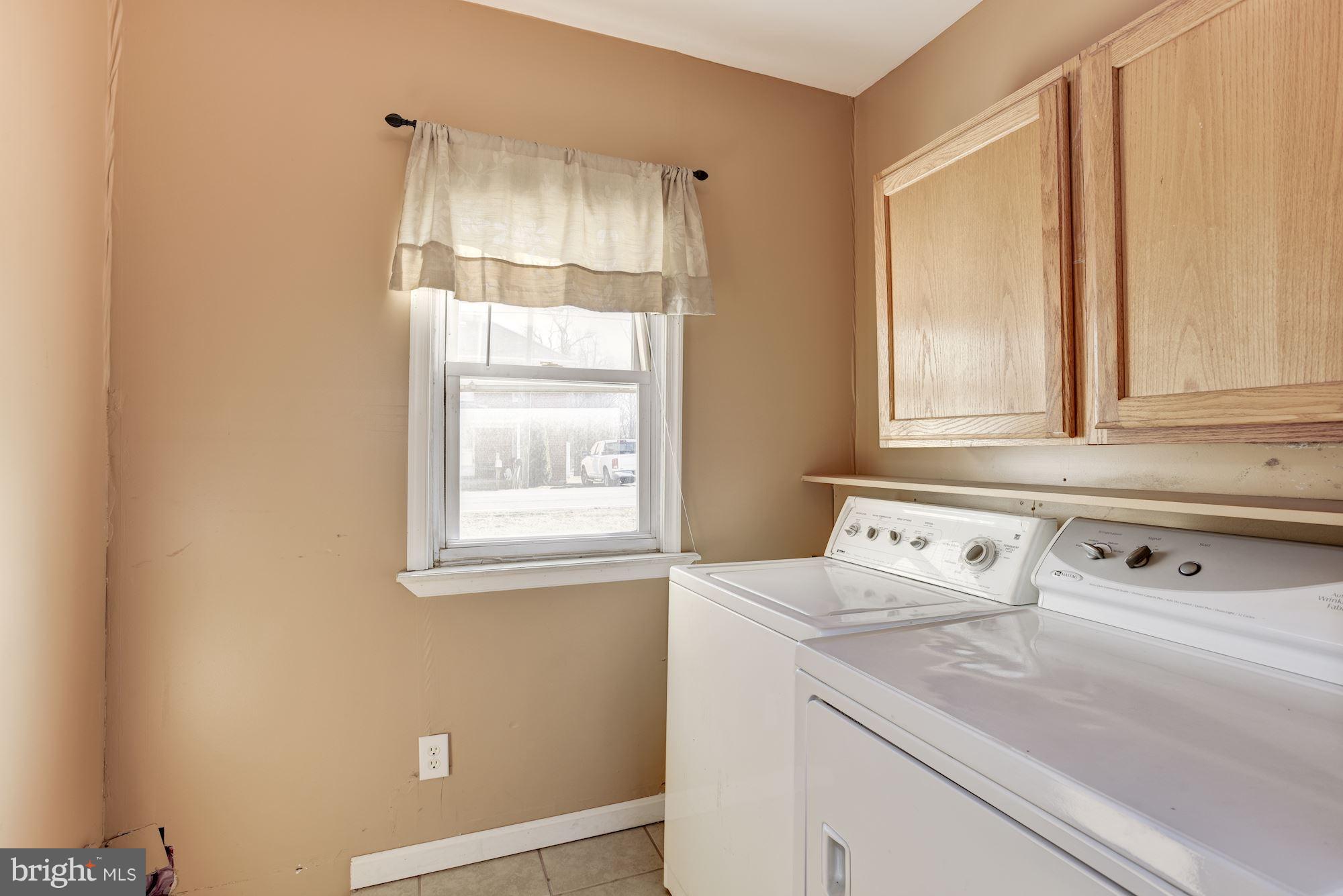 11914 Legore Bridge Road Keymar, MD 21757 - Photo 11 of 30 a bathroom with a sink and a window