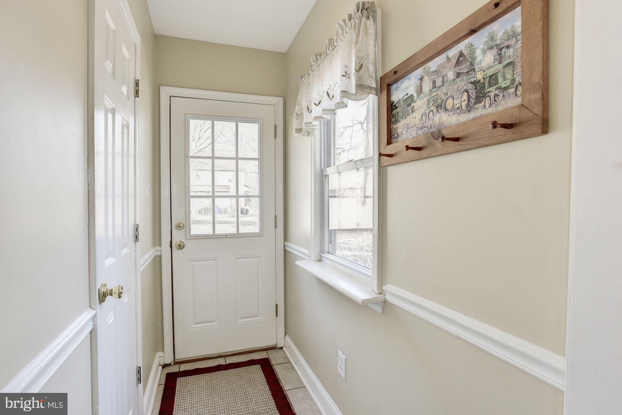 11914 Legore Bridge Road Keymar, MD 21757 - Photo 17 of 30 a view of an entryway with wooden floor