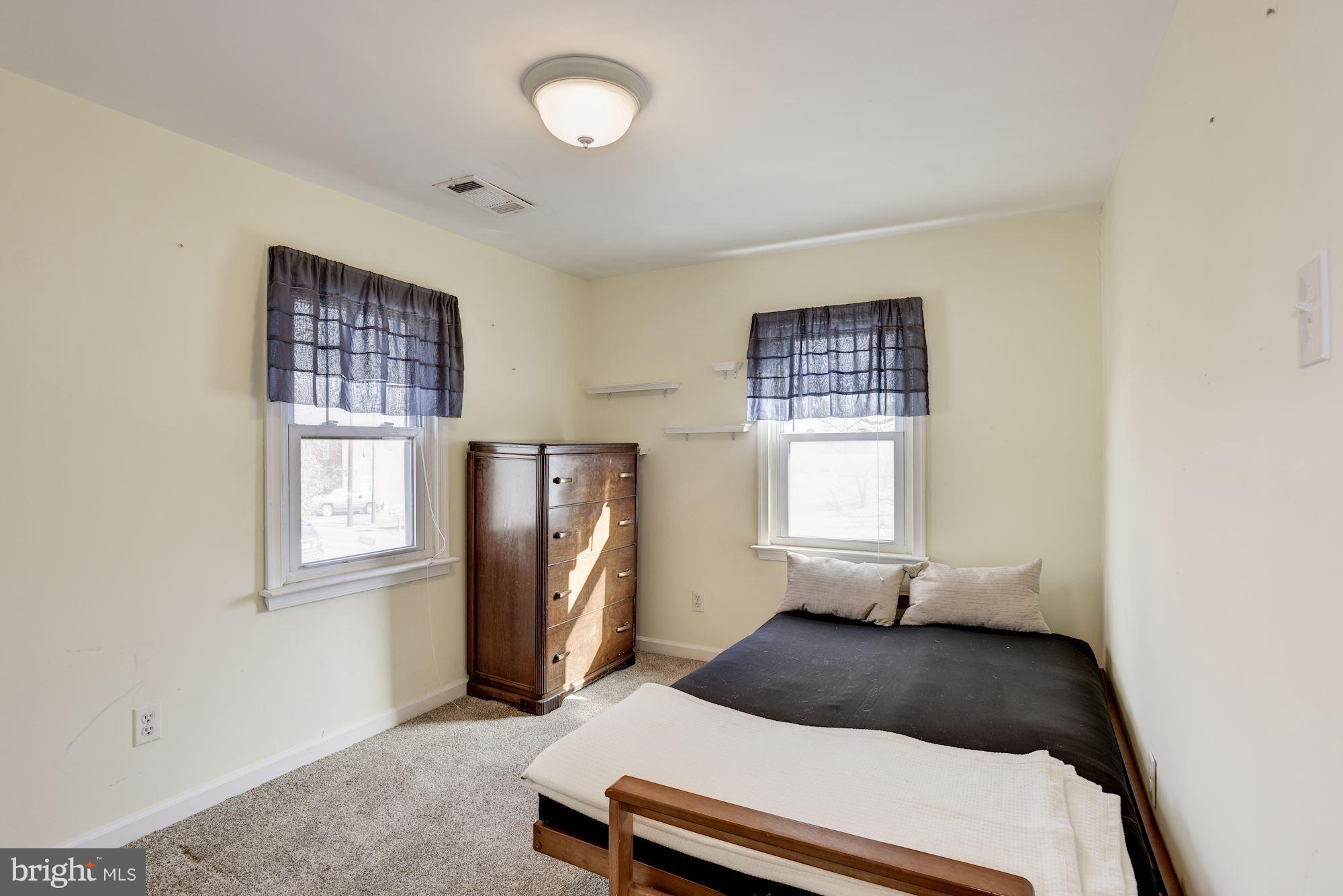 11914 Legore Bridge Road Keymar, MD 21757 - Photo 19 of 30 a bedroom with a bed and a window