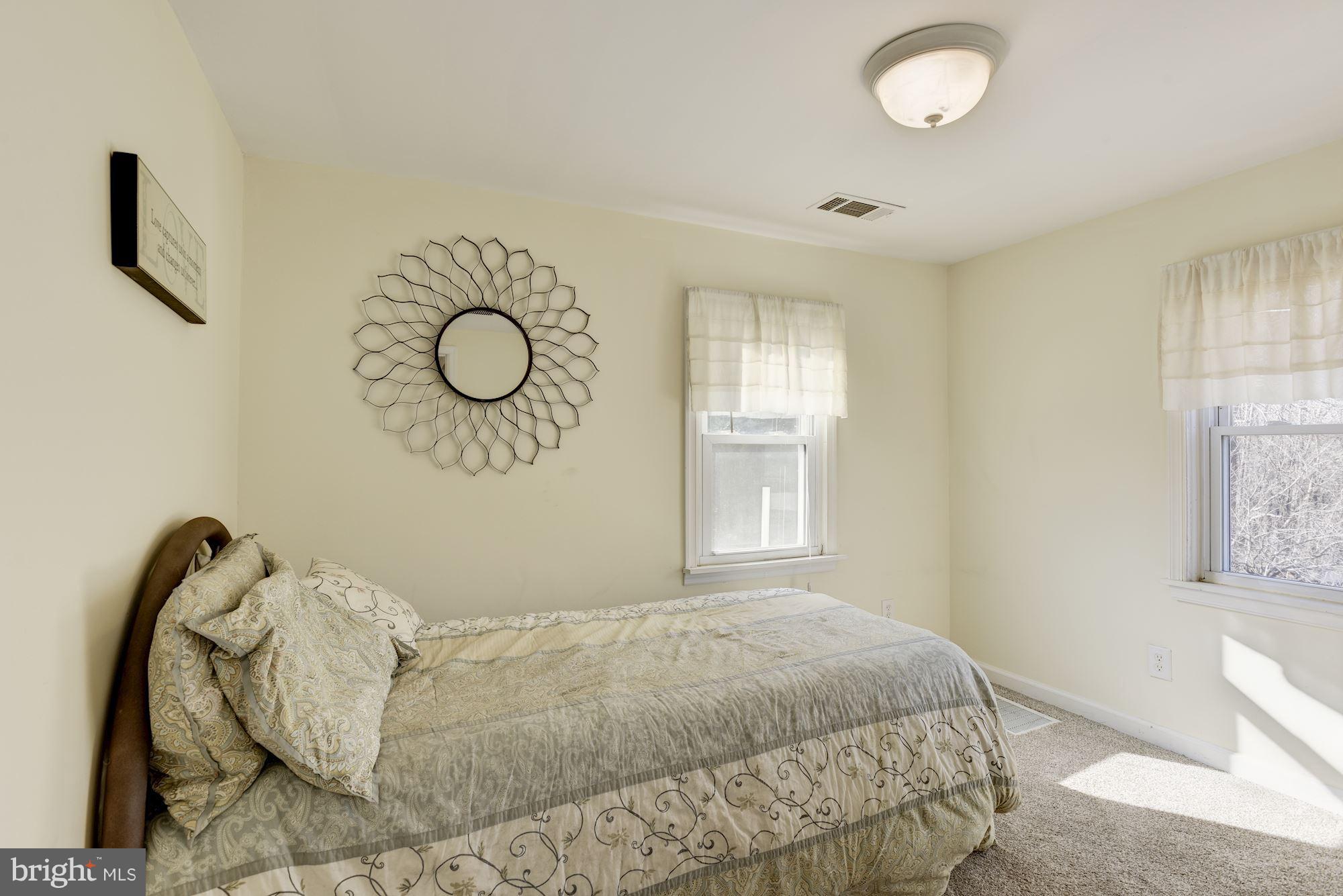 11914 Legore Bridge Road Keymar, MD 21757 - Photo 20 of 30 a bedroom with a bed and window