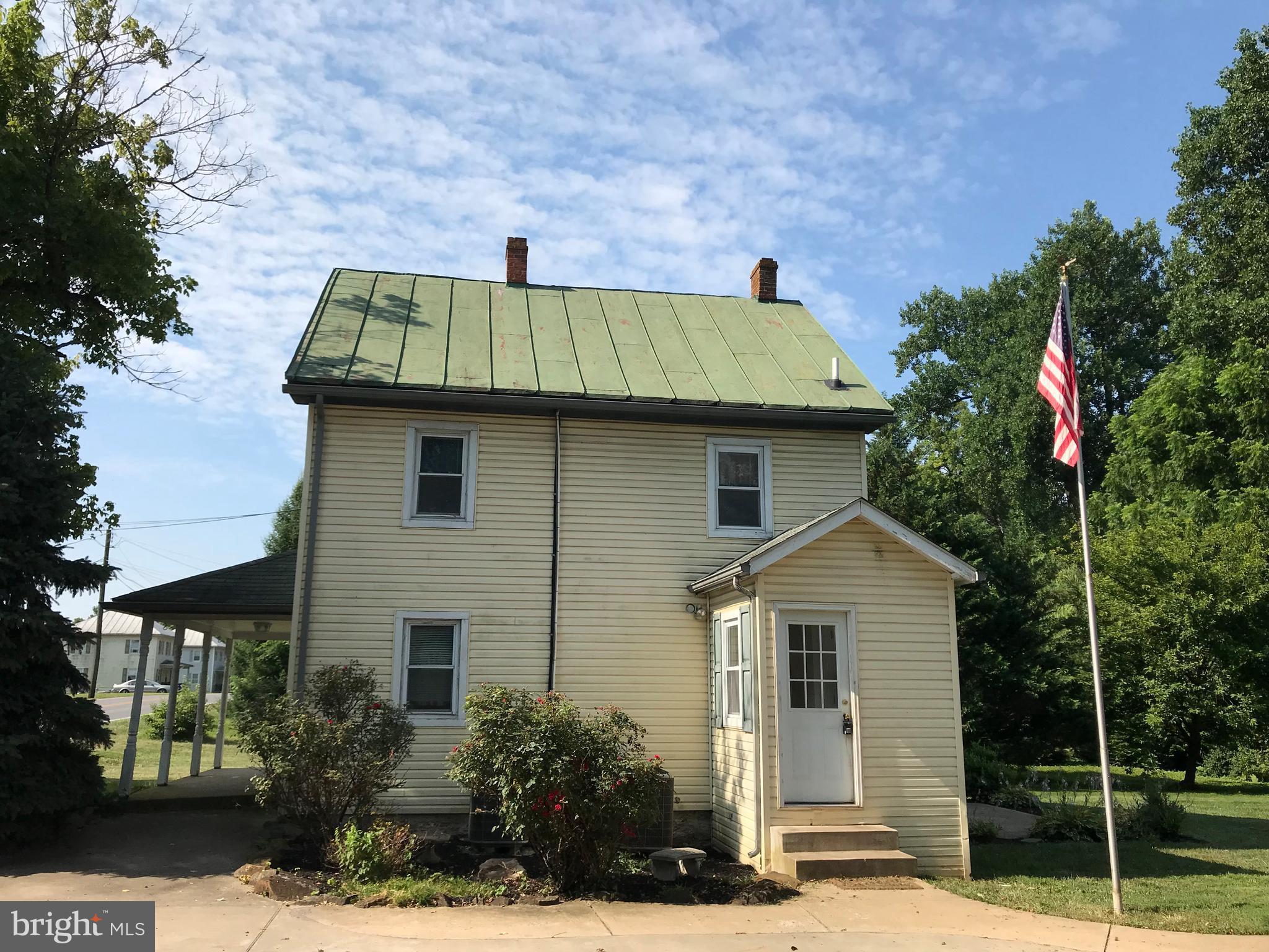 11914 Legore Bridge Road Keymar, MD 21757 - Photo 26 of 30 a front view of a house with garden