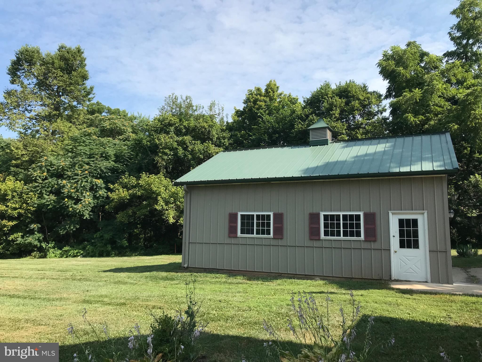 11914 Legore Bridge Road Keymar, MD 21757 - Photo 29 of 30 a house that has a big yard with plants