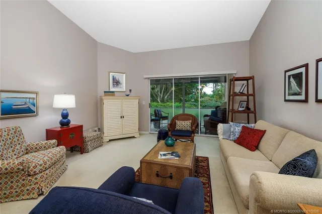 a bathroom with a sink a light fixture and a mirror