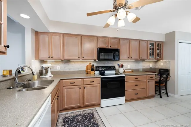 a spacious bedroom with a bed and a couch