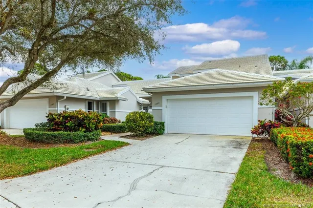 a house view with a garden space