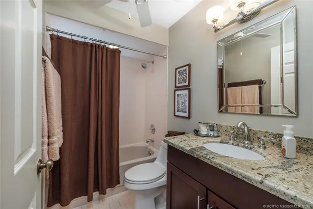 a view of a lake with a house in the background