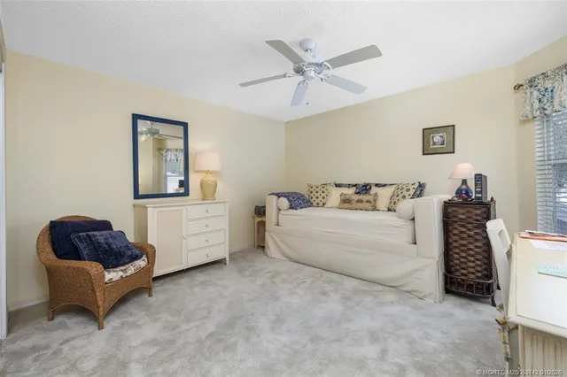 a view of a lake with a house in the background