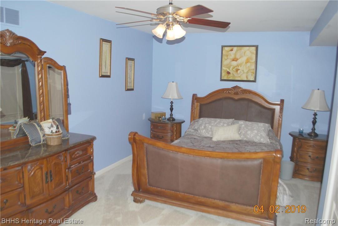 3272 Hogback Road Fowlerville, MI 48836 - Photo 18 of 34 Master bedroom