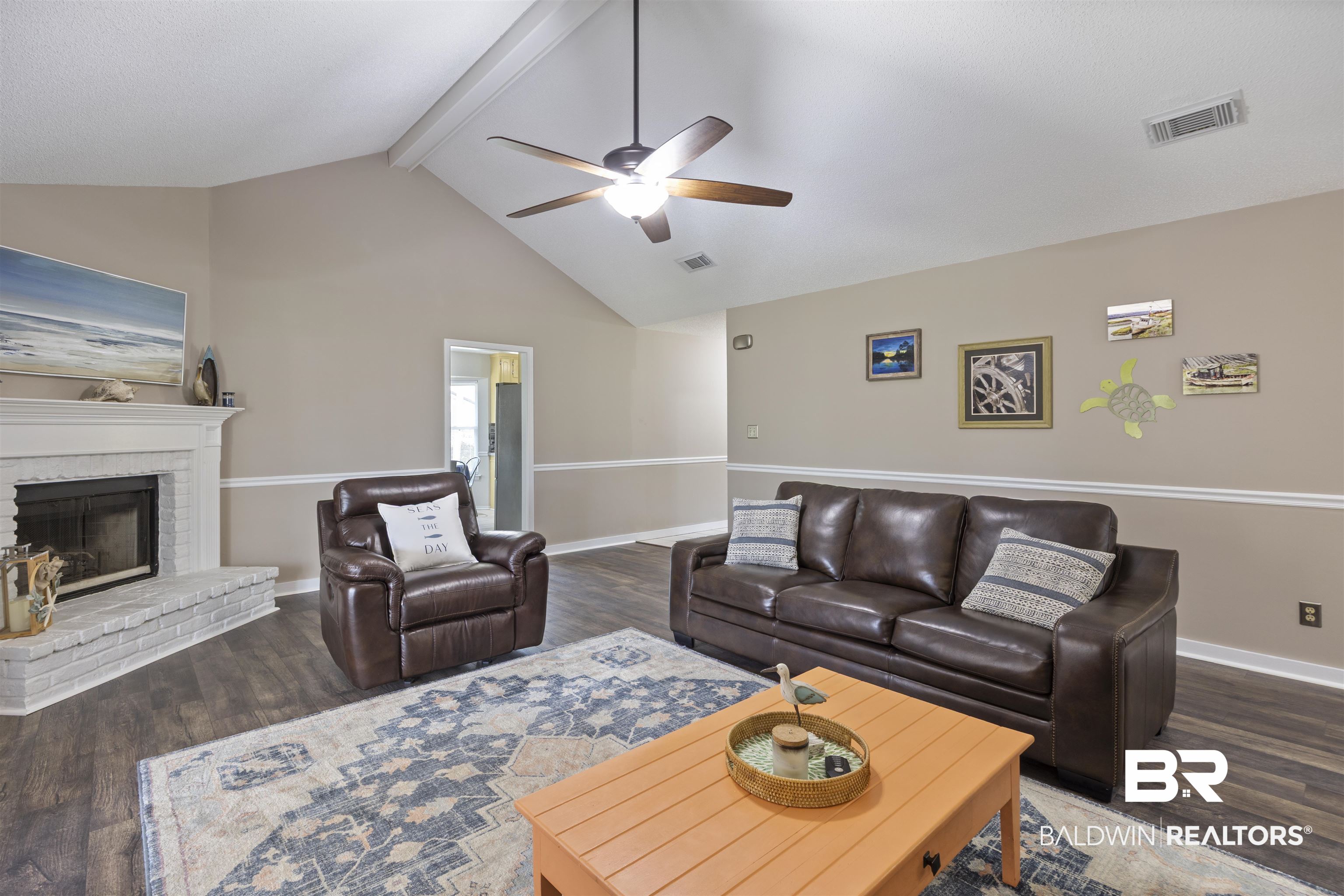 9771 Clarke Ridge Road Foley, AL 36535 - Photo 27 of 72 Living area featuring beamed ceiling and a ceiling fan.