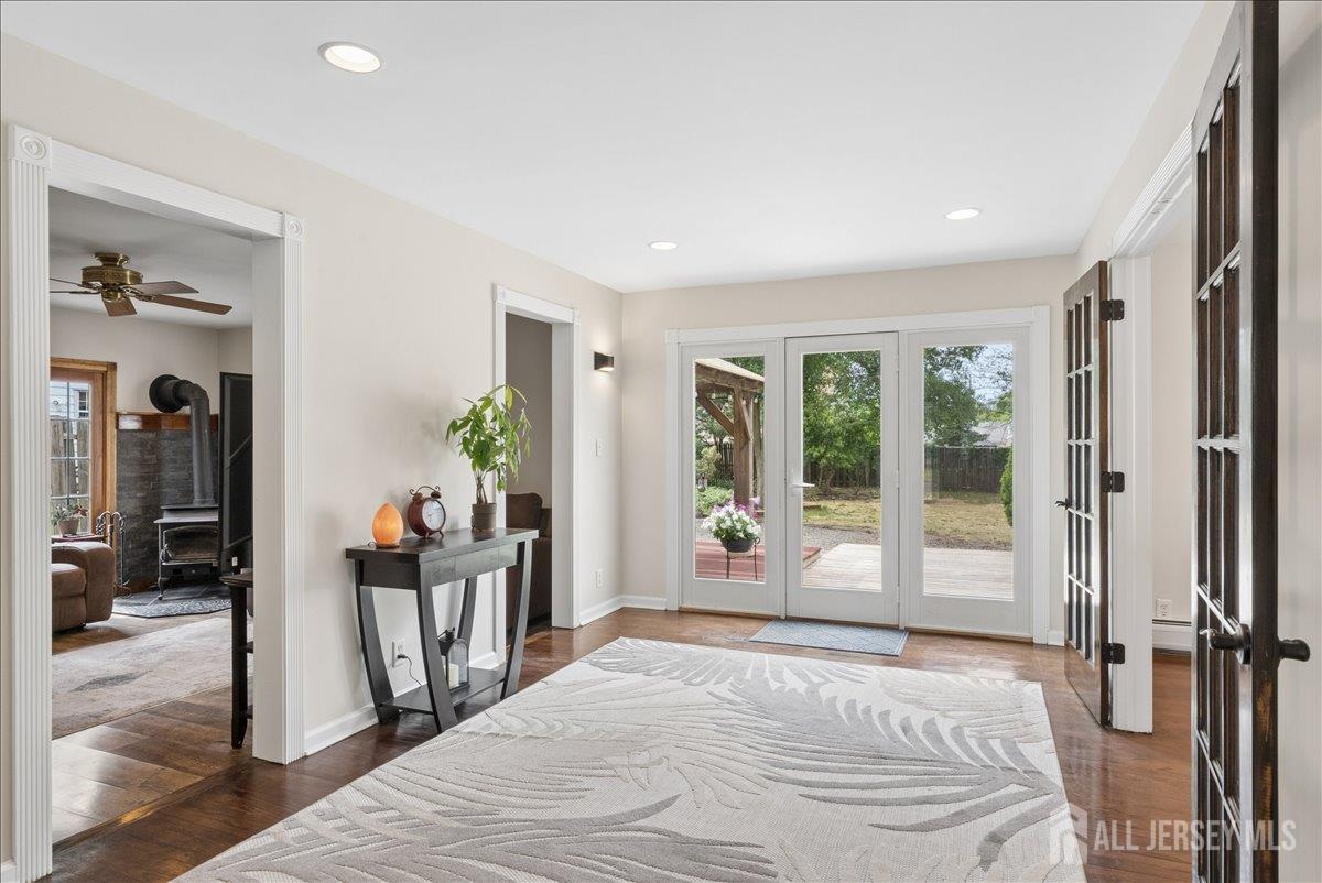 45 Walnut Street Edison, NJ 08817 - Photo 7 of 28 a bedroom with a bed and a large window with chair