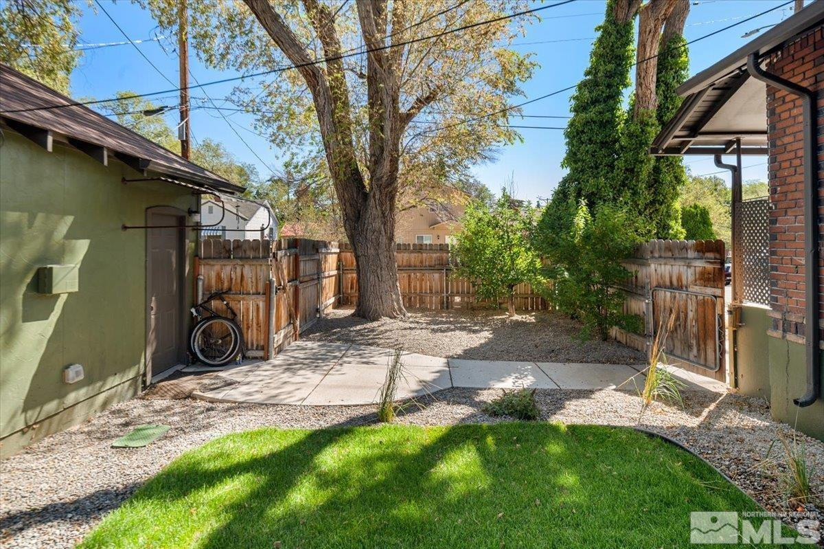 609 West 11th Street Reno, NV 89503 - Photo 11 of 29 a view of a backyard with a tree