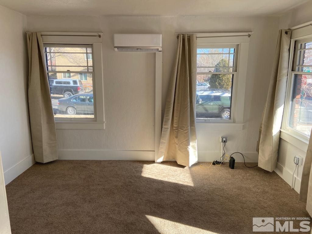 609 West 11th Street Reno, NV 89503 - Photo 19 of 29 a view of a room with wooden floor and a window