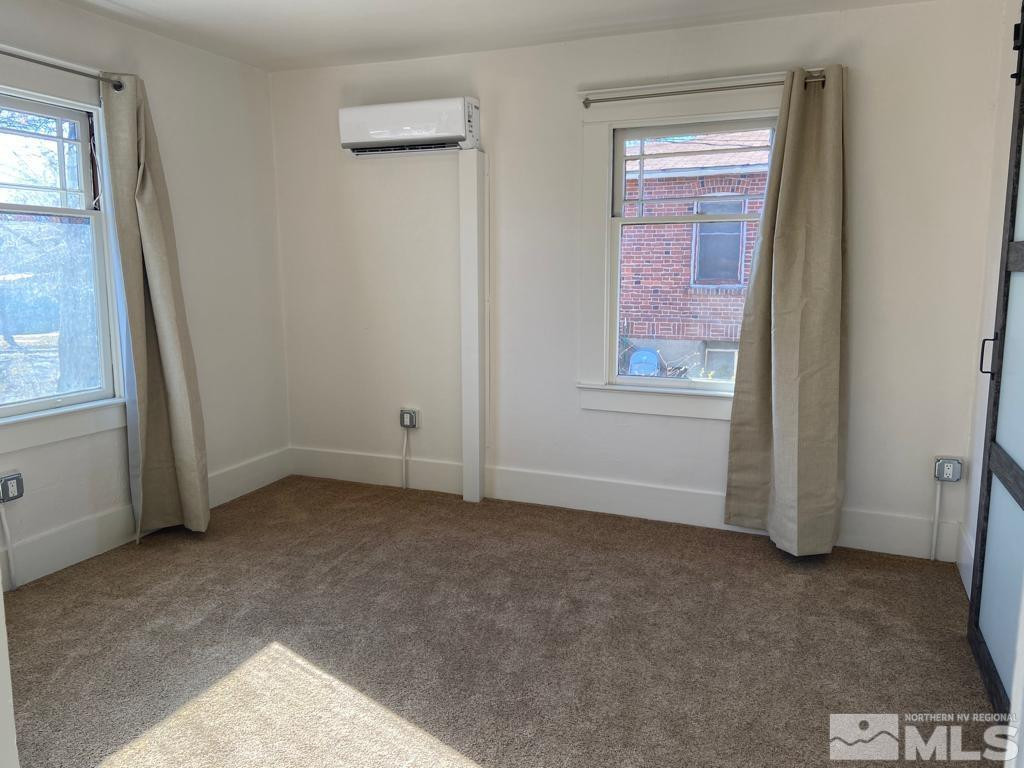 609 West 11th Street Reno, NV 89503 - Photo 22 of 29 an empty room with windows