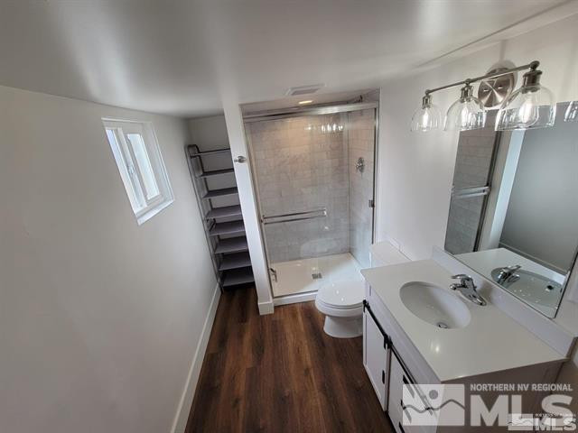 609 West 11th Street Reno, NV 89503 - Photo 24 of 29 a bathroom with a sink toilet and shower
