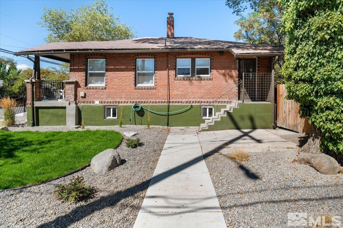 609 West 11th Street Reno, NV 89503 - Photo 6 of 29 a front view of a house with a yard