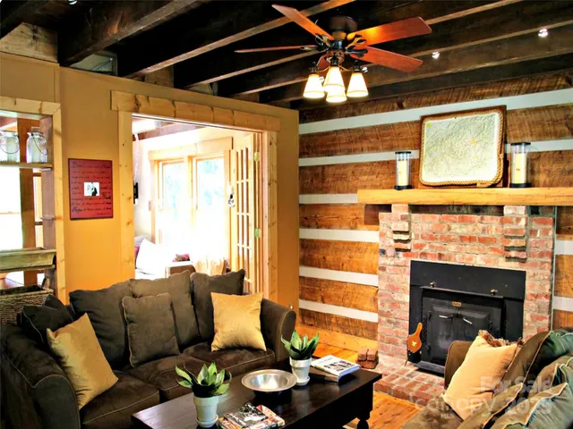 a bedroom with a large bed and a large window