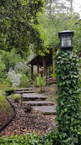 a kitchen with a refrigerator and a sink