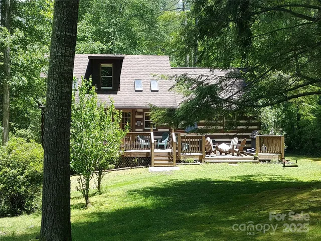 a view of swimming pool of water with green space