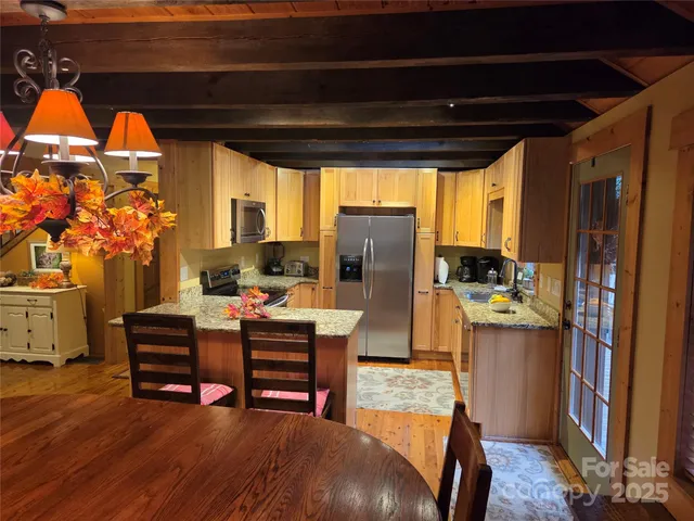 a view of a livingroom with furniture and window