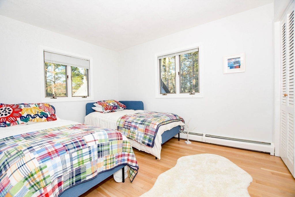 44 Register Road Marion, MA 02738 - Photo 17 of 38 a bedroom with two beds and a window