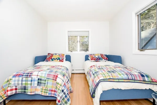 a bedroom with a bed and furniture