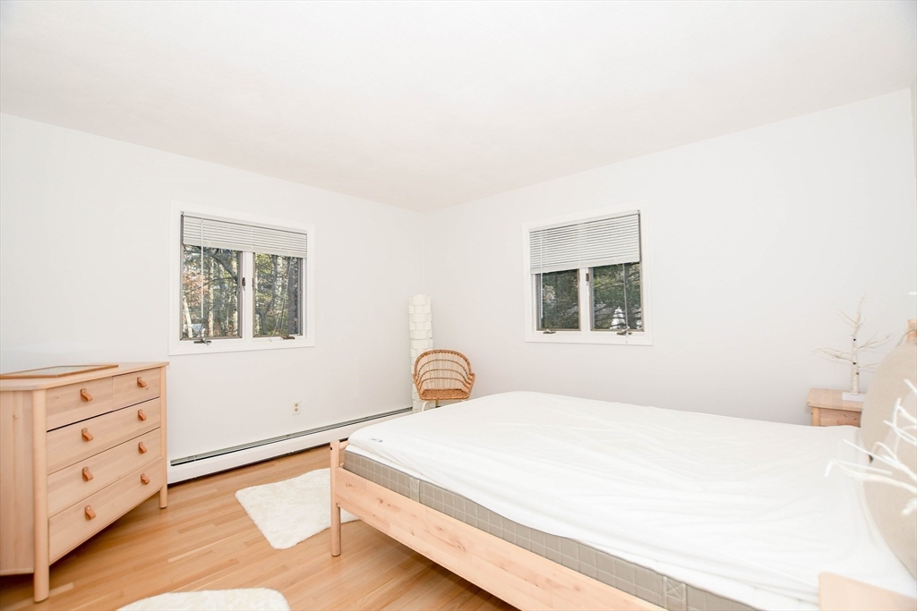 44 Register Road Marion, MA 02738 - Photo 21 of 38 a bedroom with a bed and a window