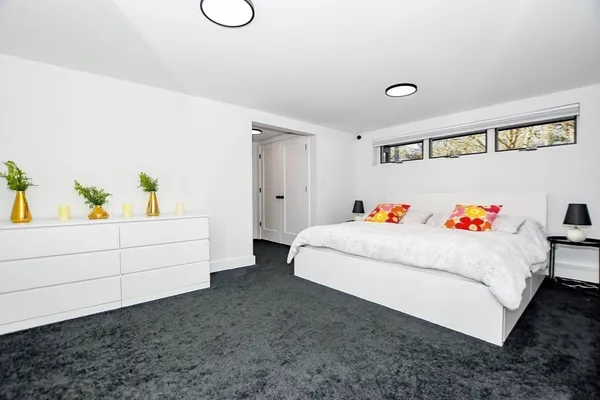a bathroom with a bathtub and shower