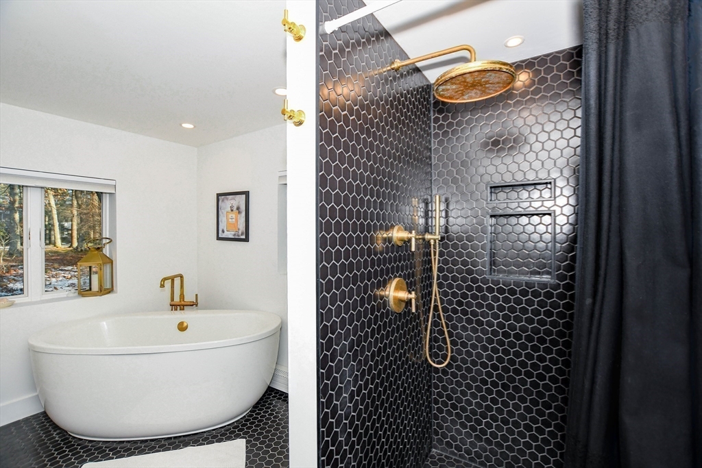 44 Register Road Marion, MA 02738 - Photo 30 of 38 a bathroom with a bathtub and shower