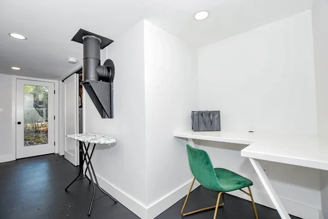 a view of storage and utility room with washer and dryer