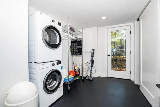 a view of a hallway with washer and dryer