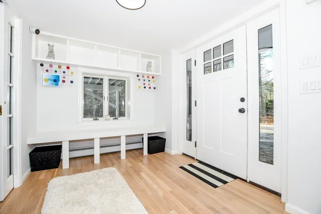 a bedroom with furniture and window