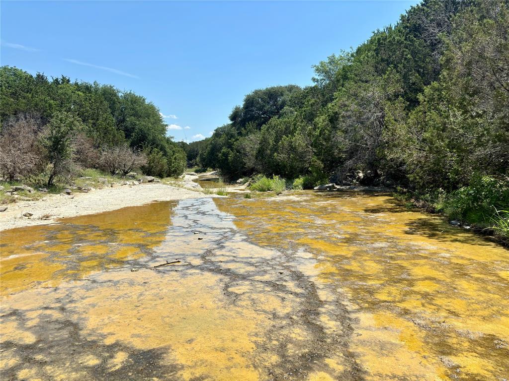 3000 Nech Ranch Court Granbury, TX 76048 - Photo 24 of 26 a view of a swimming pool with an ocean view