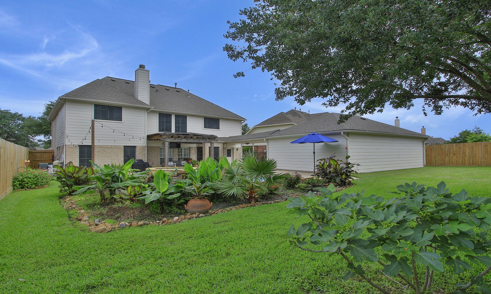8419 Marchelle Lane Spring, TX 77379 - Photo 32 of 42 a front view of a house with a yard
