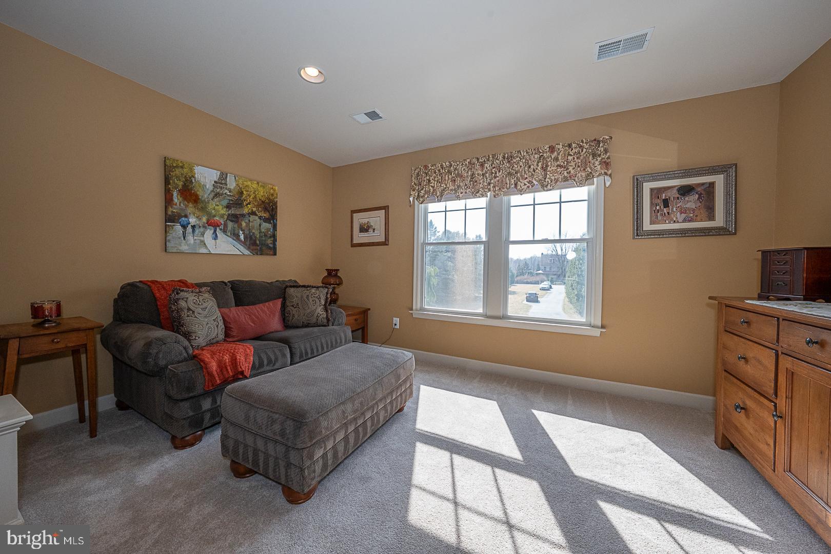 1545 Morstein Road Malvern, PA 19355 - Photo 17 of 41 a living room with furniture and a window