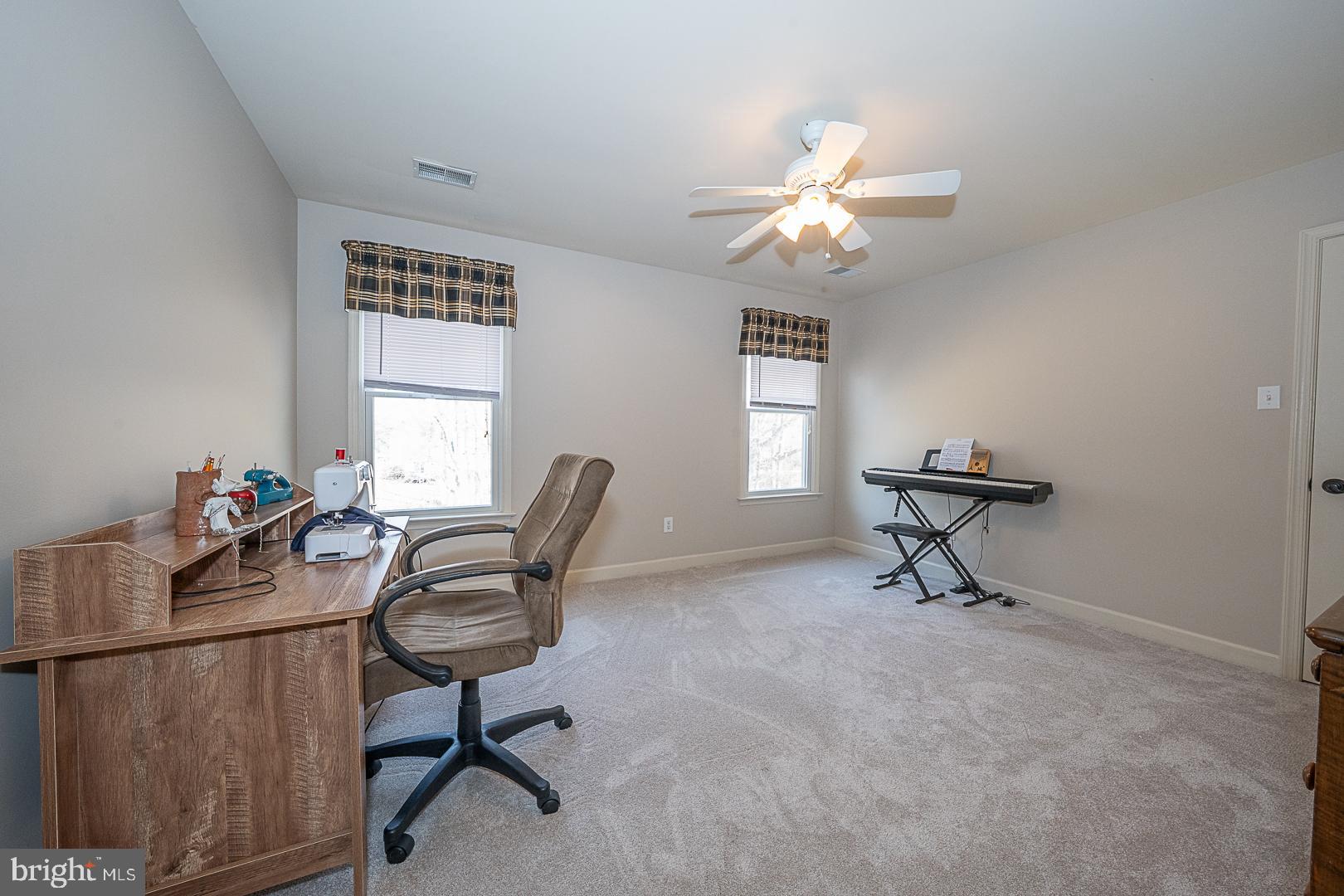 1545 Morstein Road Malvern, PA 19355 - Photo 24 of 41 a view of a workspace with furniture and a window
