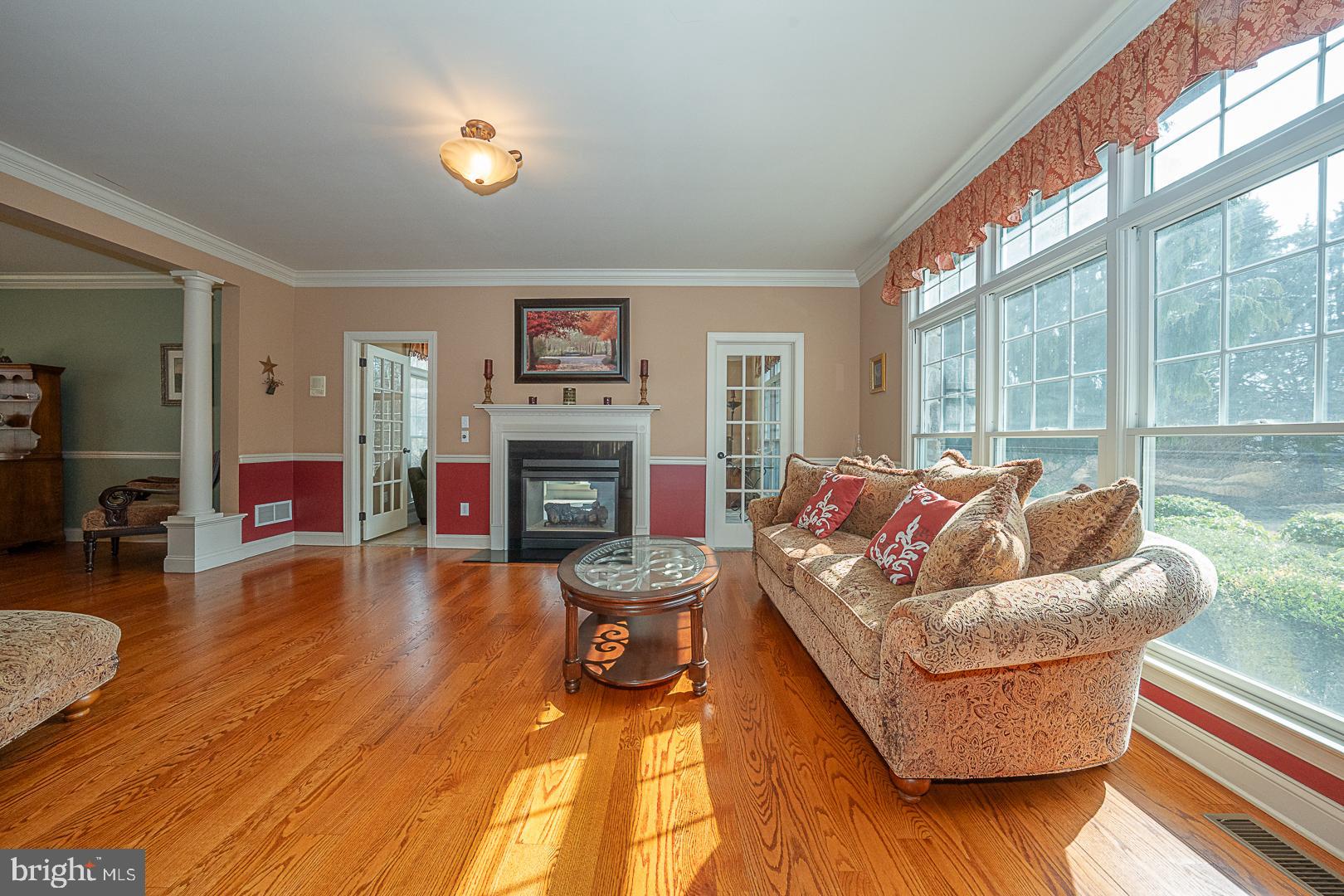 1545 Morstein Road Malvern, PA 19355 - Photo 4 of 41 a living room with furniture and a fireplace