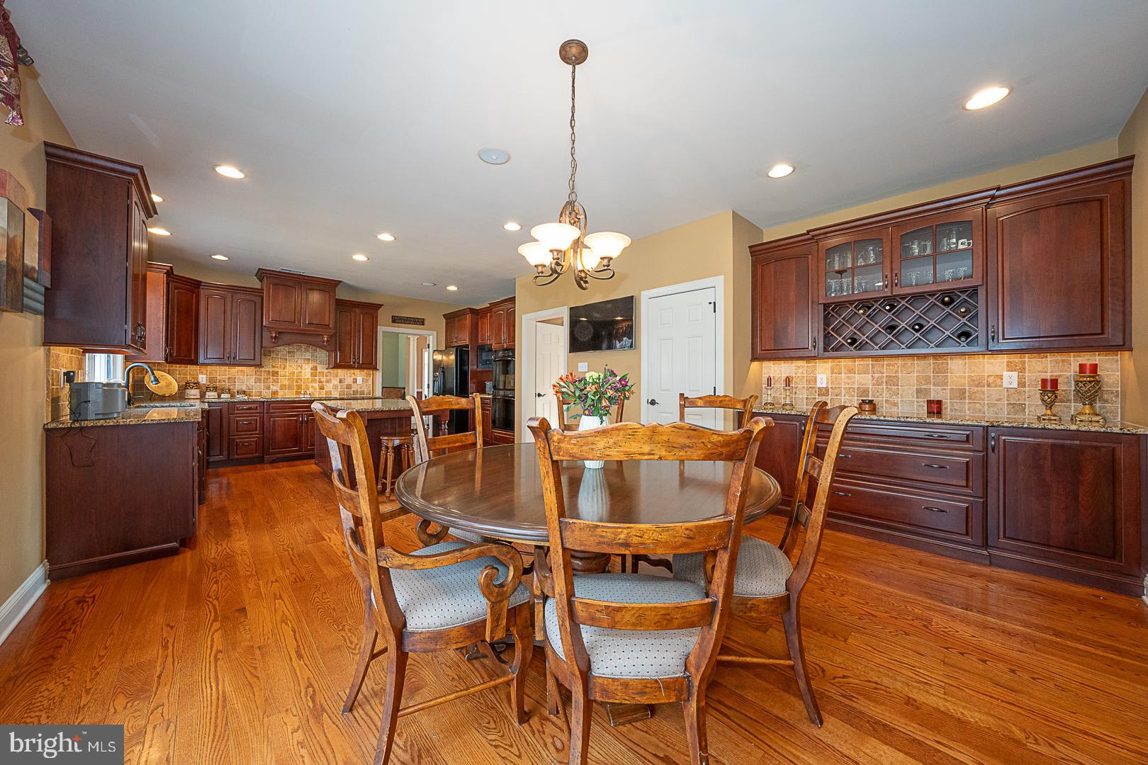 1545 Morstein Road Malvern, PA 19355 - Photo 6 of 41 a view of a dining room with furniture and wooden floor