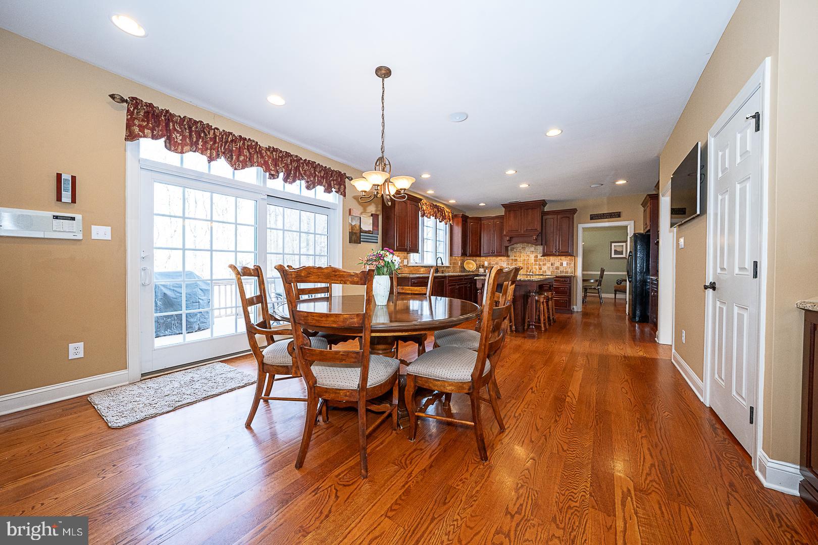 1545 Morstein Road Malvern, PA 19355 - Photo 8 of 41 a view of a dining room with furniture window and wooden floor