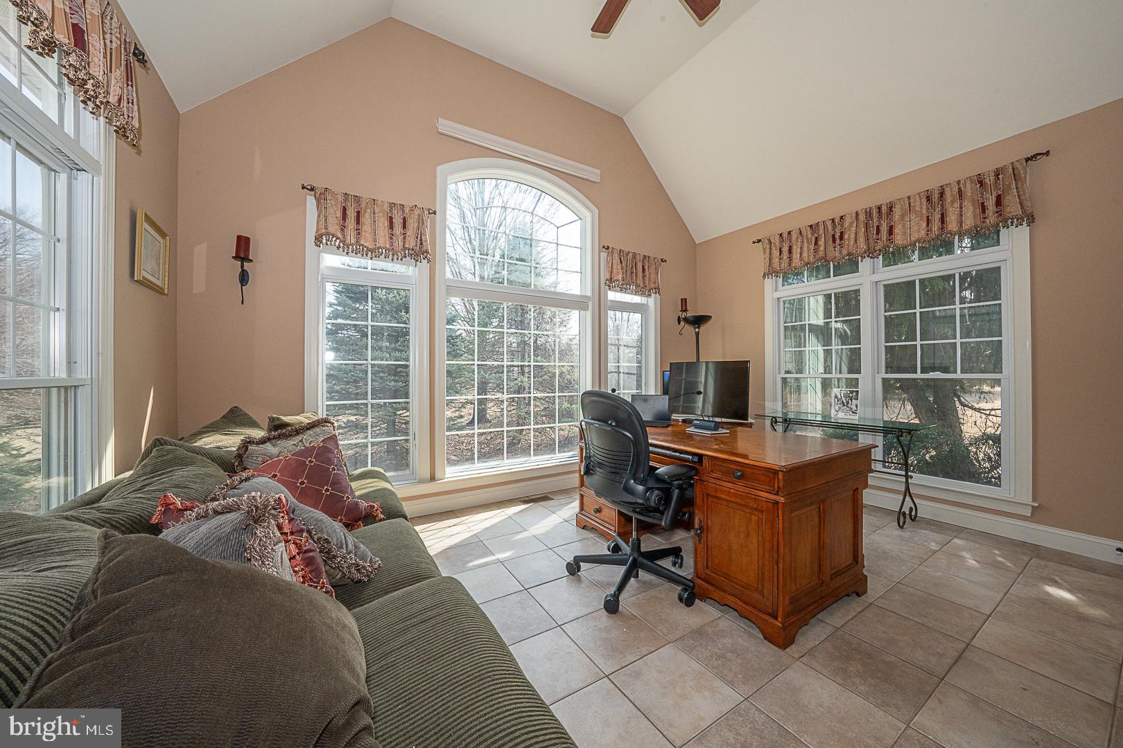 1545 Morstein Road Malvern, PA 19355 - Photo 10 of 41 a living room with furniture and a floor to ceiling window