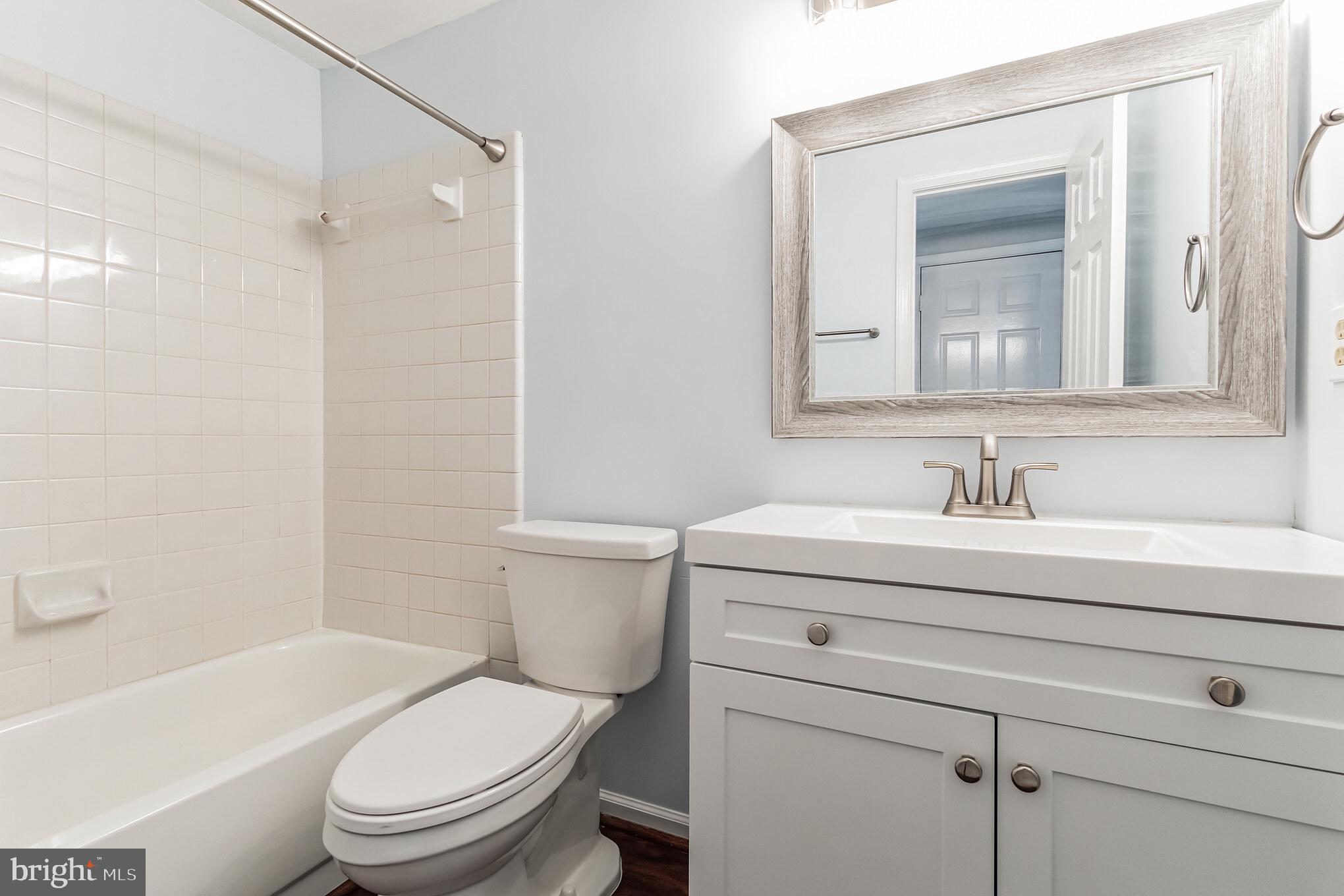 115 Peyton Road Sterling, VA 20165 - Photo 18 of 33 Primary Bath w New Vanity, Lighting & Mirror