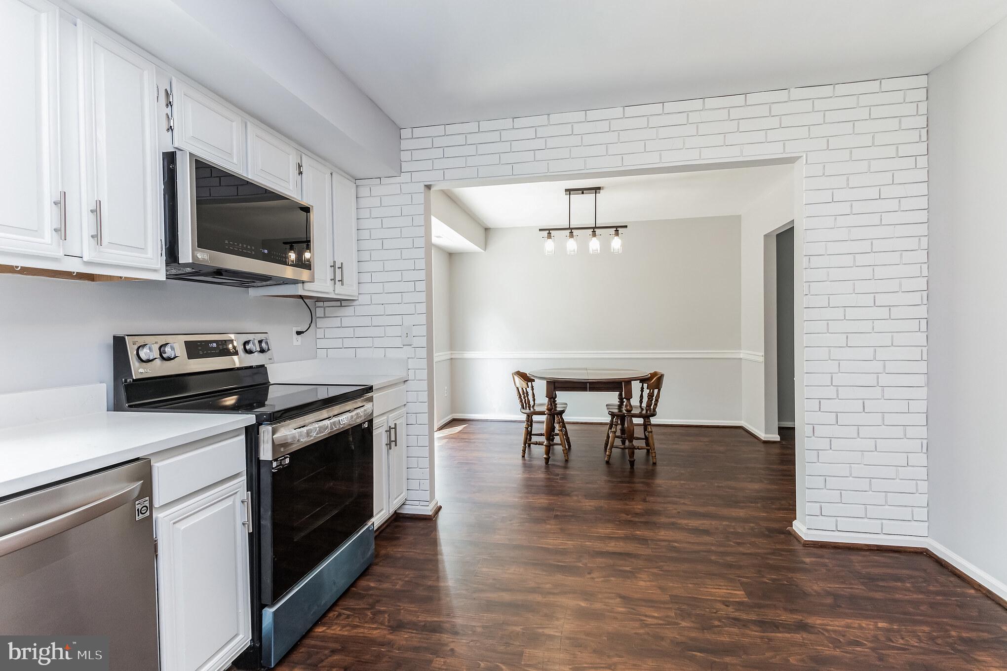 115 Peyton Road Sterling, VA 20165 - Photo 5 of 33 The Kitchen Is Open To The Dining Room