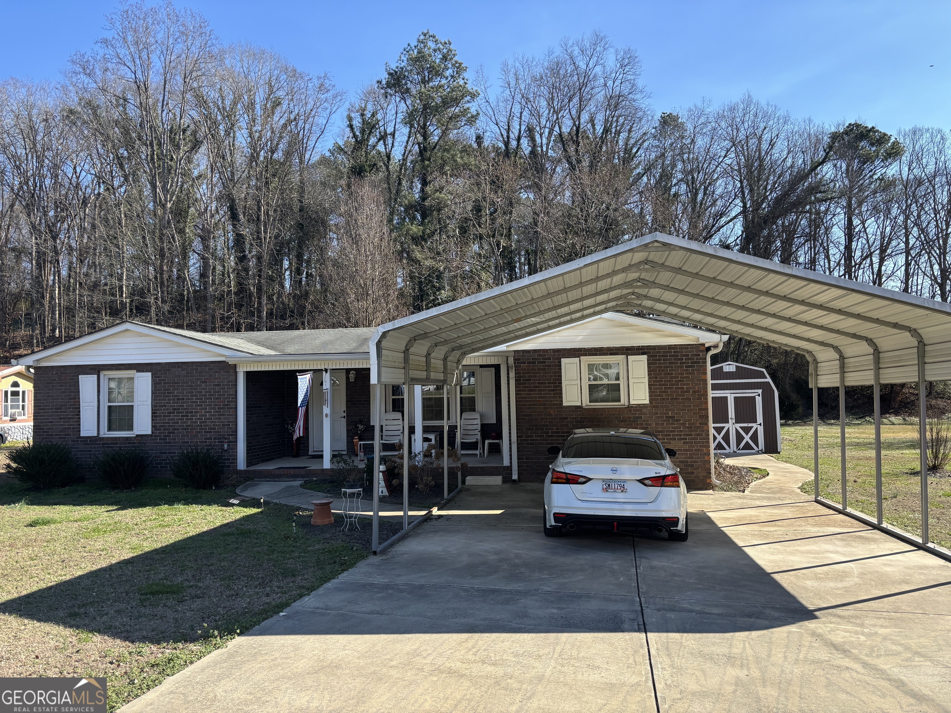 1517 Cave Spring Road Southwest Rome, GA 30161 - Photo 2 of 25 a car parked in front of house