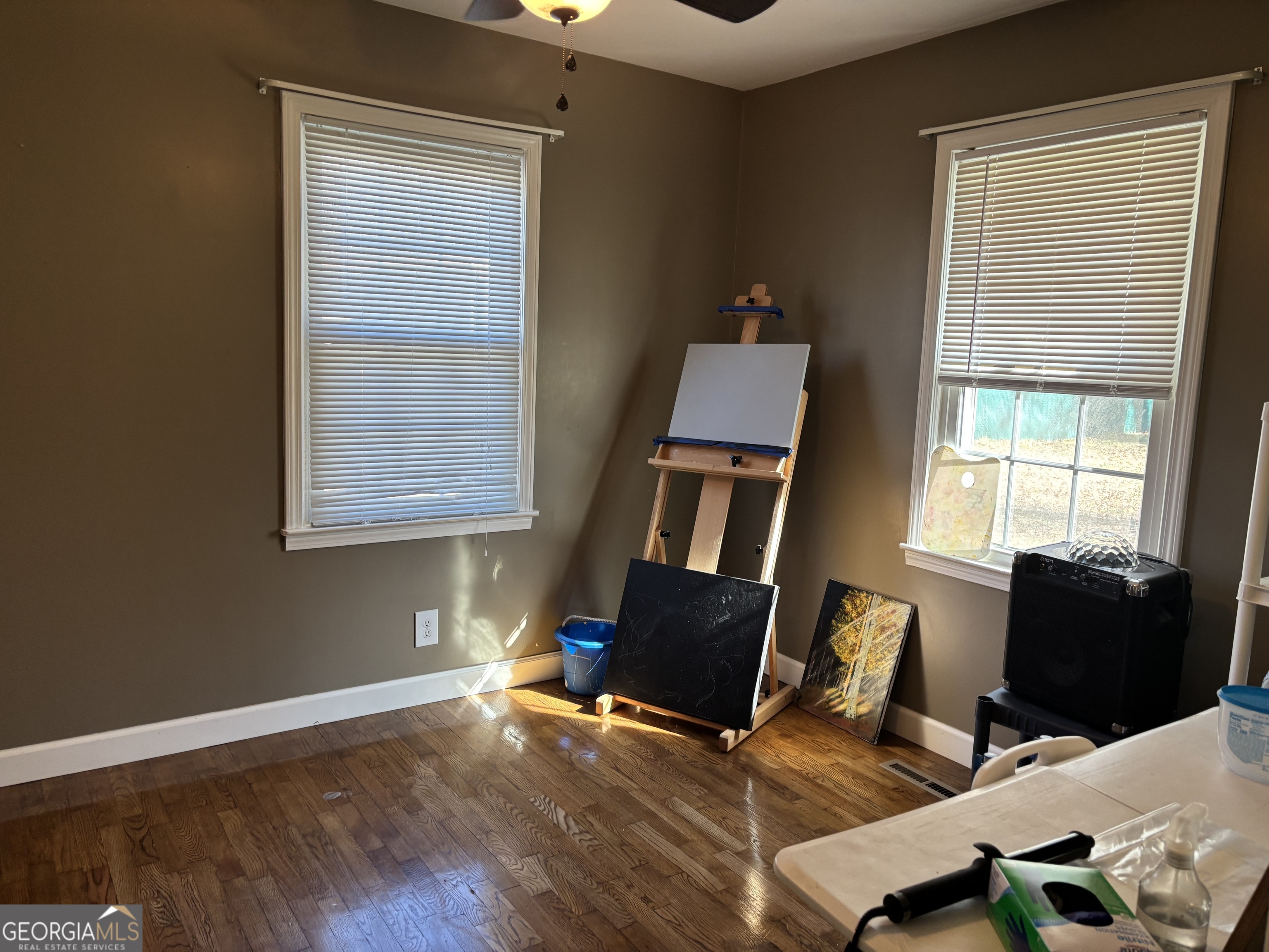 1517 Cave Spring Road Southwest Rome, GA 30161 - Photo 22 of 25 a living room with furniture and a window