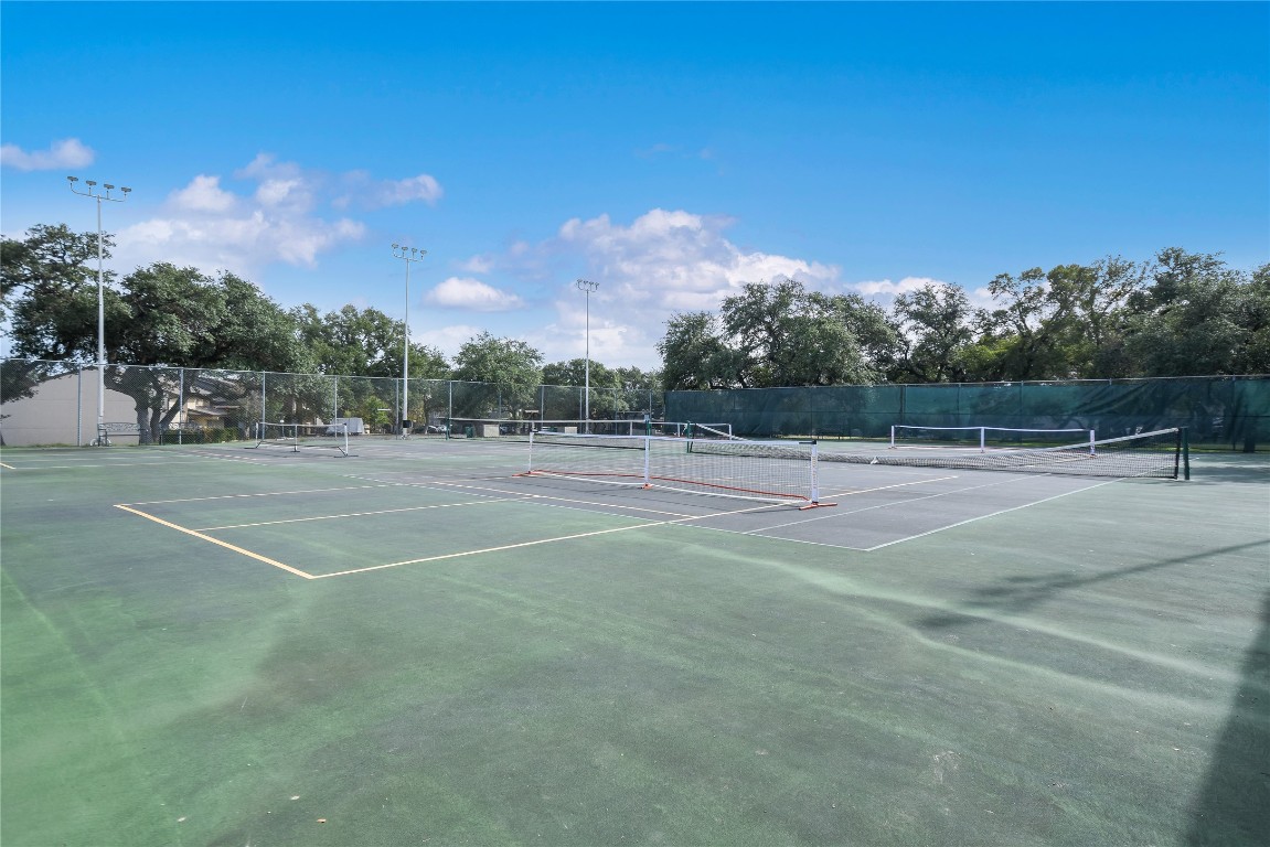 203 Champion Cove Point Venture, TX 78645 - Photo 8 of 10 a view of a tennis court
